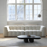 White fabric tuxedo arm sofa with biscuit back, 27.55 inches tall